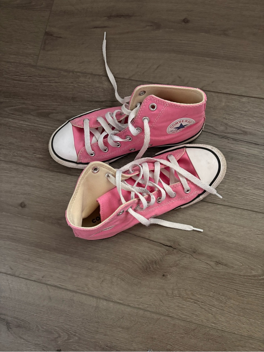 Pink High-Top Converse Sneakers